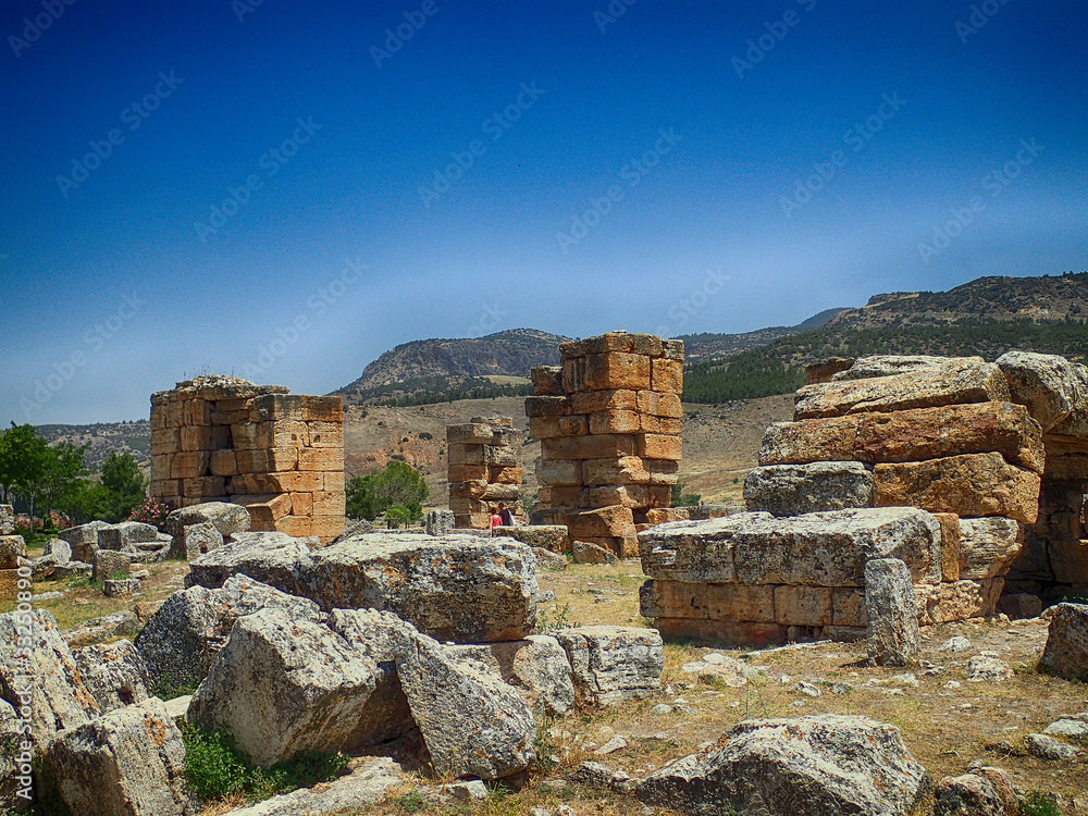  old ruins of the Roman spa city of Hierapolis on the site of the current poison on a warm summer sunny day