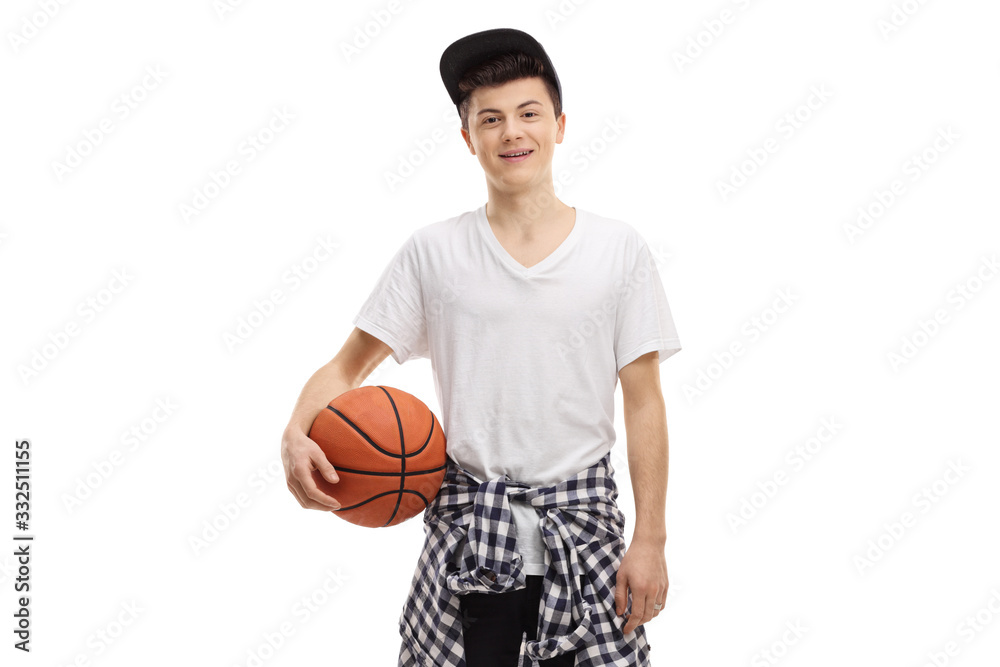 Cool teenager guy posing with a basketball Cool teenager guy posing with a basketball