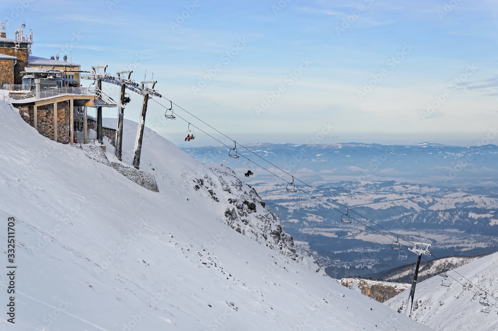Obraz premium Chair lifts on the top of Kasprowy Wierch in Zakopane in winter