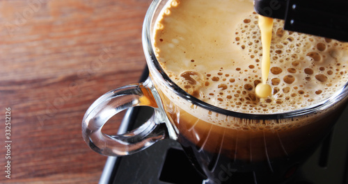 coffee glass espresso coffee machine wooden background photo