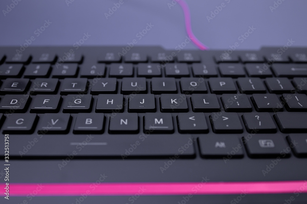 Close-up photo of black keyboard on the table. Office, working from home concept Close-up photo of black keyboard on the table. Office, working from home concept