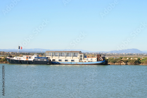 River boats in Villeneuve les Maguelone, a seaside resort in the south of Montpellier, Herault, France © Picturereflex