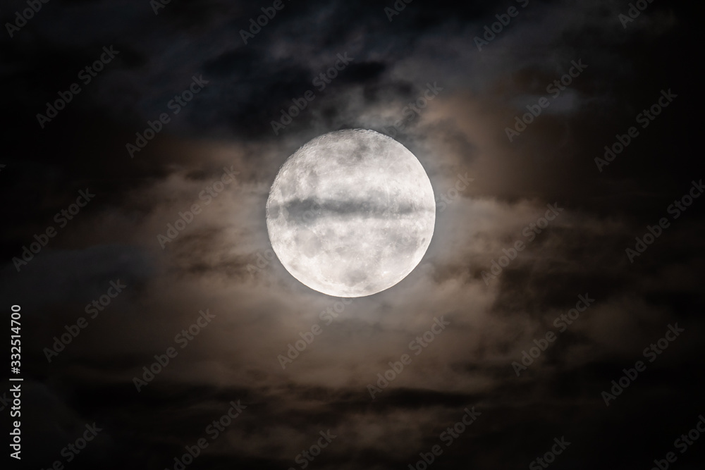 Full moon amongst the clouds