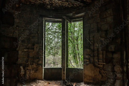 Big window in the middle of old ruins
