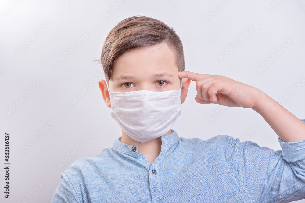 Handsome brunette boy in medicime mouth mask showed think about safe Handsome brunette boy in medicime mouth mask showed think about safe