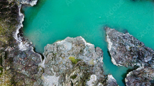 Mountain turquoise river, rocky banks aerial view. Drone shooting. Katun River, Altai.