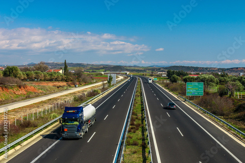 Route from Greece to Turkey. Greek Egnatia road with trucks and cars traffic. Greece, Evros, Alexandroupoli.
