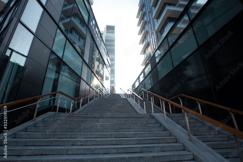 A staircase in a big city leading to multi-storey modern houses. 01.20 Milan A staircase in a big city leading to multi-storey modern houses. 01.20 Milan