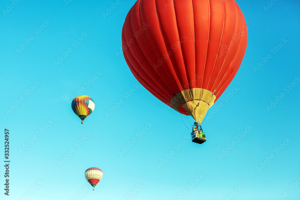 Fototapeta premium Balloon Festival. Flying balloons against the blue sky.