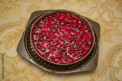 Textured surface of freshly baked cherry pie