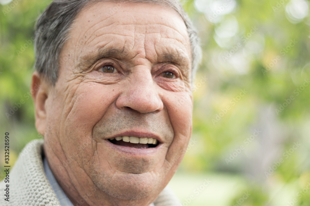 Portrait of senior man smiling Portrait of senior man smiling