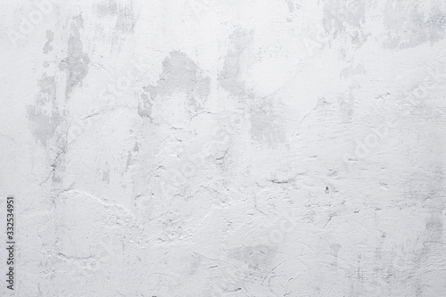 Old grunge white wall background. Texture of aged whitewashed wall