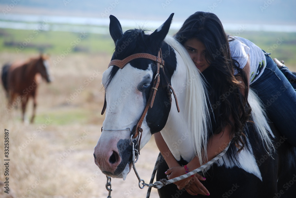 Obraz premium portrait of a horse with a girl