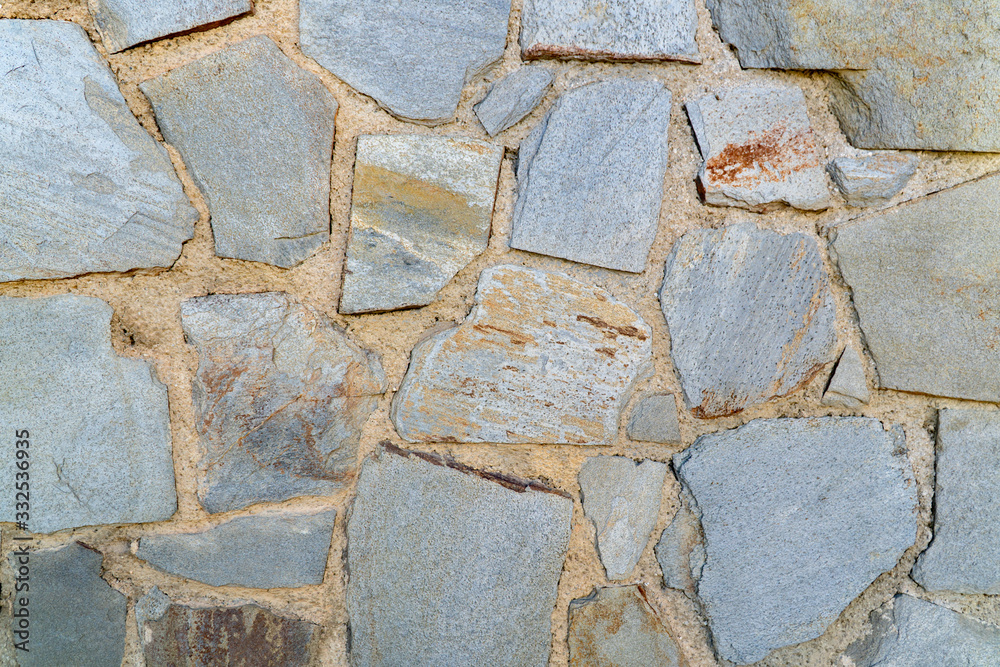 Texture of a stone wall. Old castle stone wall texture background. Stone wall as a background or texture. Texture of a stone wall. Old castle stone wall texture background. Stone wall as a background or texture.
