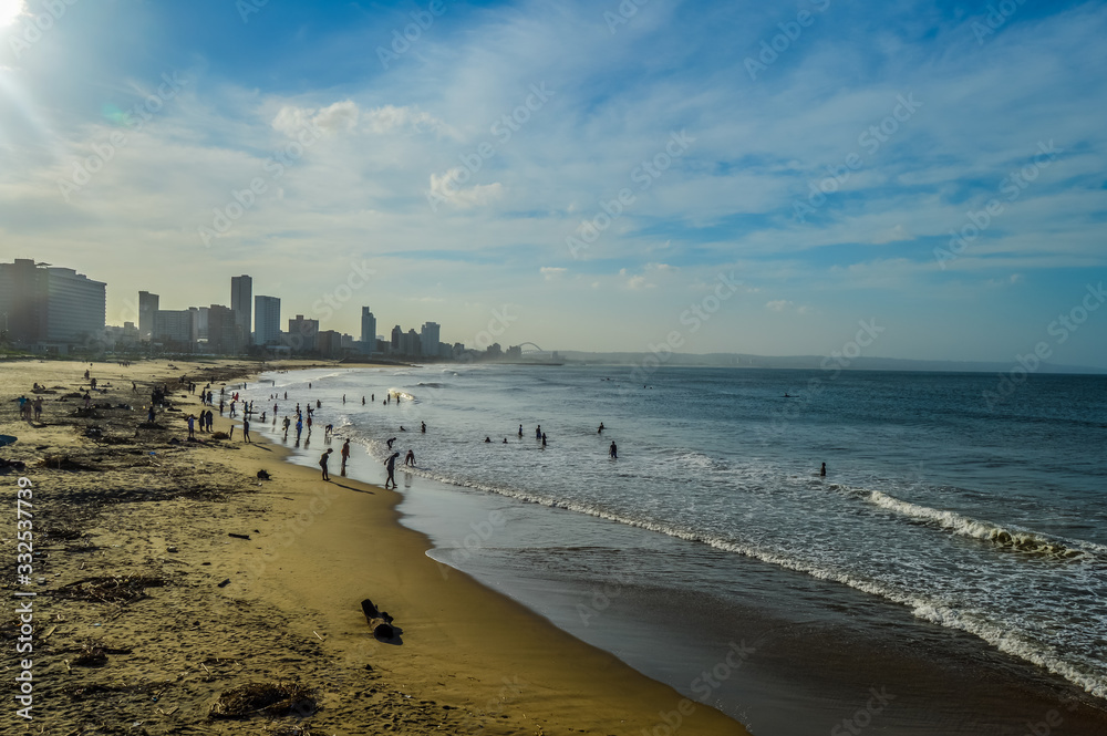 Durban golden mile beach with white sand and skyline South Africa