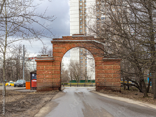 Brick arch of the gate at the entrance to the old noble manor 'Uzkoe' photo