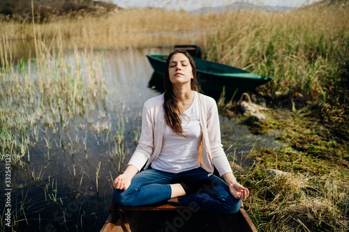 Принти на полотні Woman meditating in nature