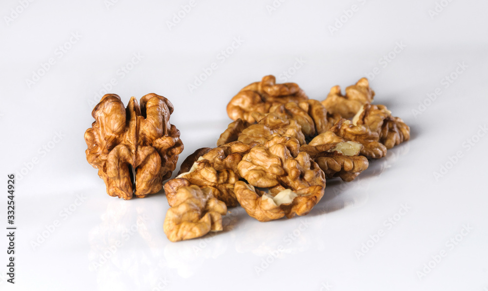 Walnut kernels on a white background