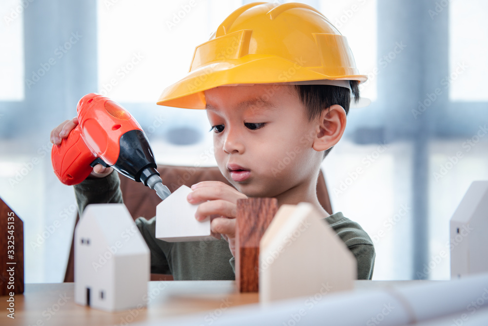 Portrait asian Boy 3 years old Playing toys.To learn and enhance development, little engineer or architect. Portrait asian Boy 3 years old Playing toys.To learn and enhance development, little engineer or architect.