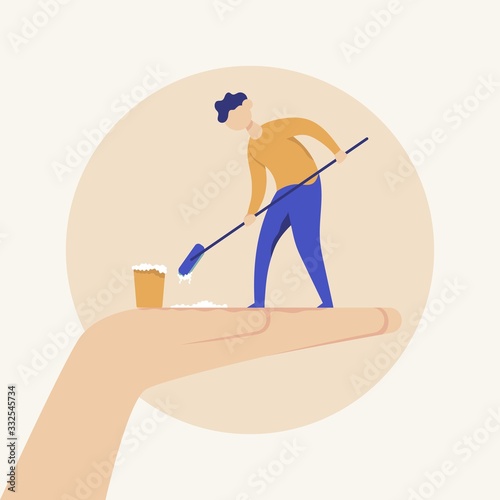 Man stands on his hand and washes it with a brush and soap.