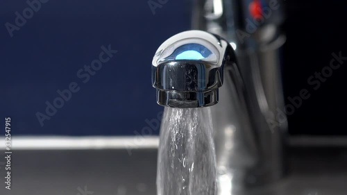 Close up of tap running and clean water UK 4K