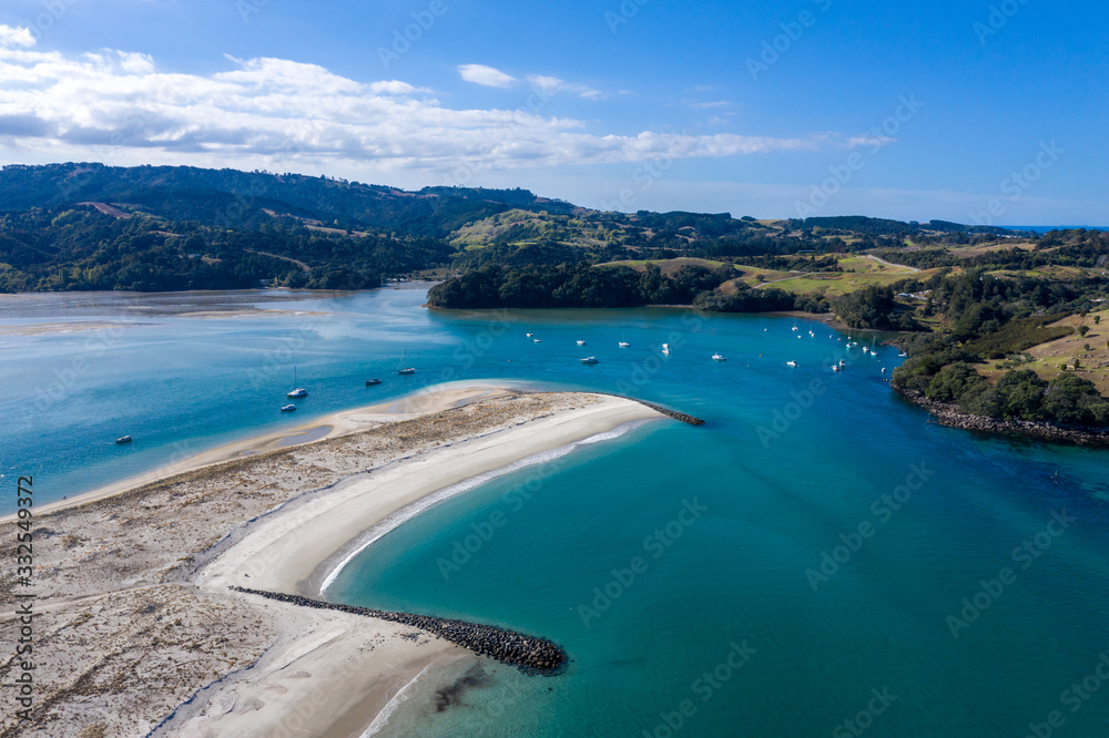 Aerial View from the Beach, Green Trees, City Streets and Waves of Omaha in New Zealand - Auckland Area	