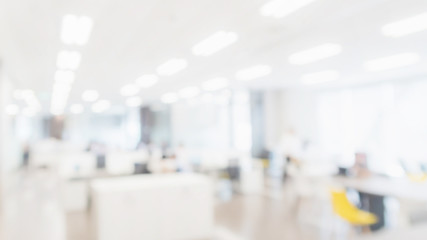Abstract blurred interior modern office space with business people working banner background with copy space.