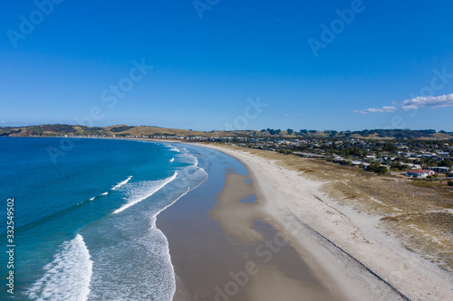 Aerial View from the Beach  Bay  Green Trees and Sea of Omaha in New Zealand - Auckland Area 