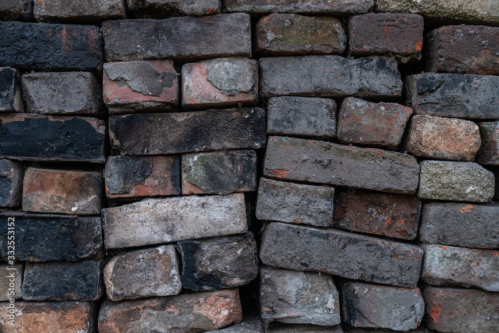 Naklejka premium Red Brick wall background. Old Red stone blocks panoramic texture