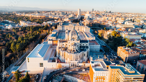 Aerial view of Madrid Cathedral Santa Maria la Real de La Almudena in Madrid  Spain and Royal Palace at sunset. Architecture and landmark of Madrid. Cityscape of Madrid