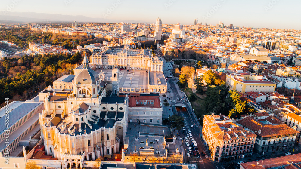 Aerial view of Madrid Cathedral Santa Maria la Real de La Almudena in Madrid, Spain and Royal Palace at sunset. Architecture and landmark of Madrid. Cityscape of Madrid