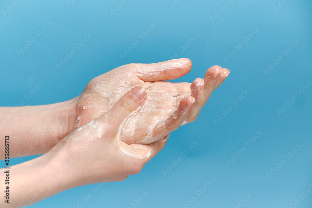 Hand washing Isolated on a blue background. Hand washing Isolated on a blue background.