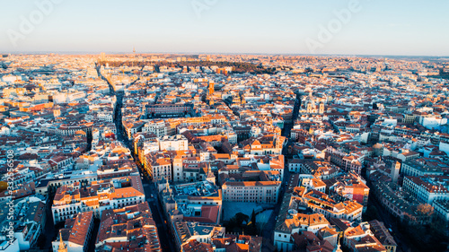 Aerial view of Madrid city centar at sunset. Architecture and landmarks of Madrid. Cityscape of Madrid,Popular tourist attraction at Barrio Centro. photo