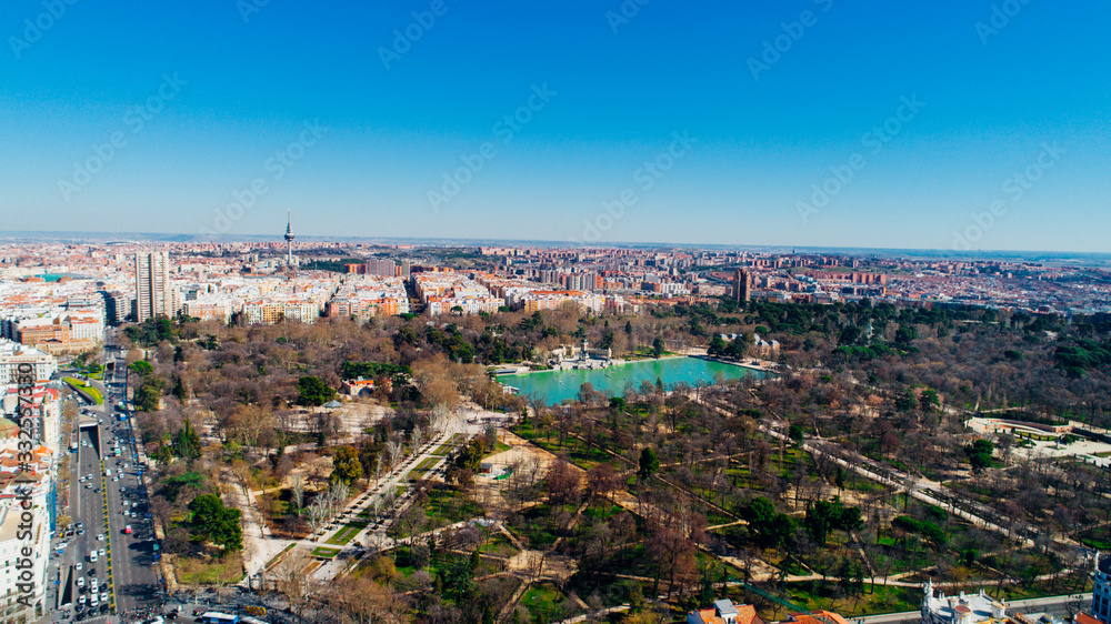 Panoramic view of Retiro park in Madrid, Spain. El Retiro aerial cityscape. One of the largest parks of the city of Madrid.