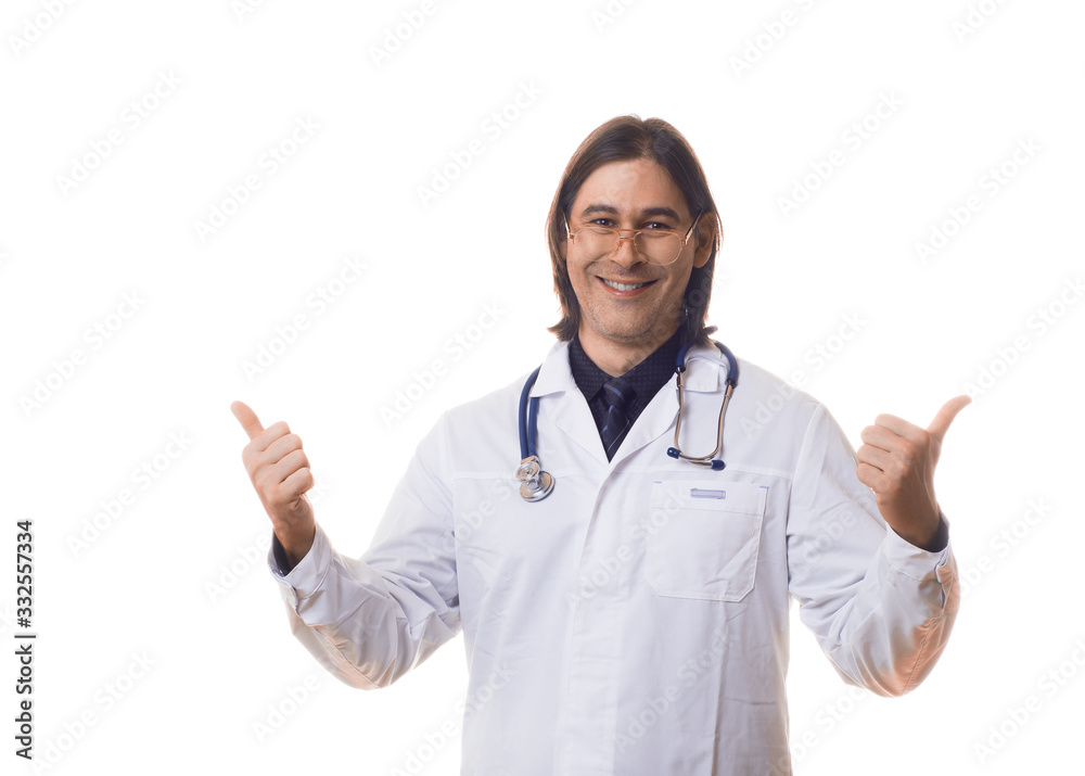 Happy smiling doctor smiling isolated over white background keeps thumbs up Happy smiling doctor smiling isolated over white background keeps thumbs up