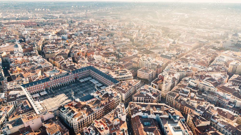 Obraz premium Aerial view of Plaza Mayor in Madrid,Spain. Plaza Mayor is a central plaza in the city of Madrid. Beautiful sunny day in city,architecture and landmark of Madrid. Center of capital of Spain