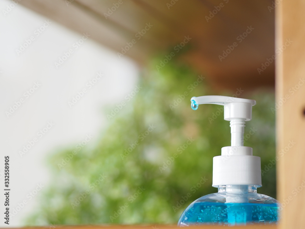 Hand Sanitizer, gel alcoholic mixture with gelatin in clear Plastic bottle with pump pushing, washing clean dirty to prevent germs protect colona virus, covid 19 Hand Sanitizer, gel alcoholic mixture with gelatin in clear Plastic bottle with pump pushing, washing clean dirty to prevent germs protect colona virus, covid 19