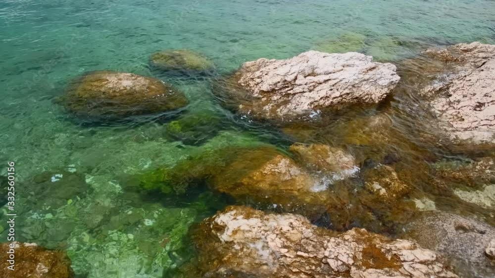 Big rocks and stone coast of Adriatic sea. Slow motion. 4k Big rocks and stone coast of Adriatic sea. Slow motion. 4k