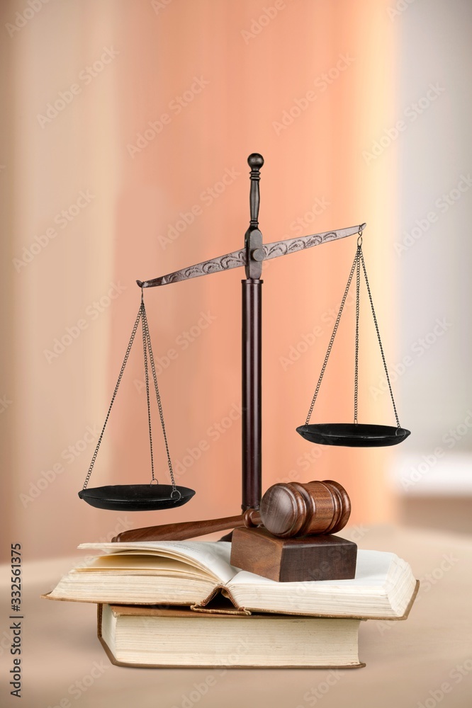 Justice Scales and books and wooden gavel on table. Justice concept