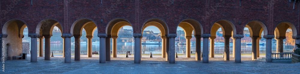 The Parterre and arcade at the Stockholm Town City Hall empty of people a sunny spring day