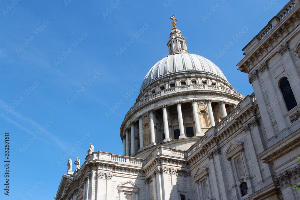 The dome of St Paul's Cathedral against blue clear sky, London, UK
