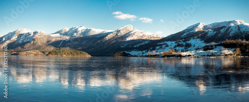 Scenic coastline of Oltedalsvatnet lake during winter season, Gjesdal commune, Norway, February 2018 photo