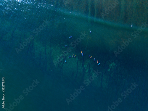 Aerial view of group of surfers, Bali, Indonesia