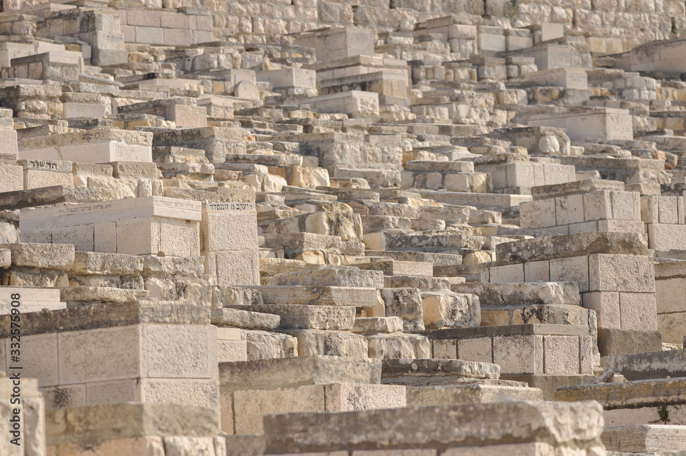 Jerusalem. Stone slabs with stones instead of flowers left by praying for the dead.
