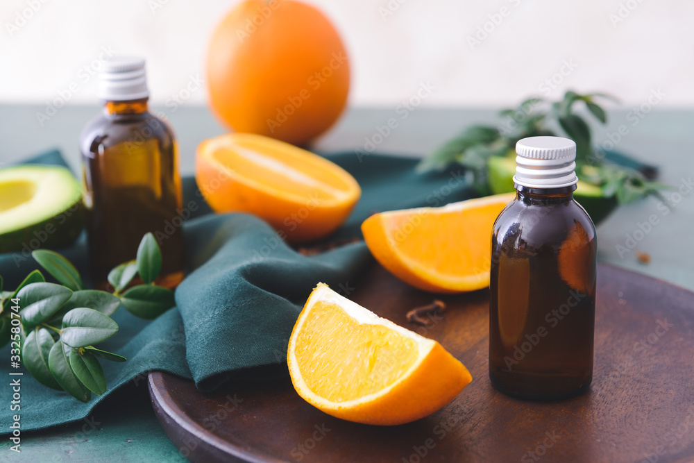 Bottle with essential oil on table Bottle with essential oil on table