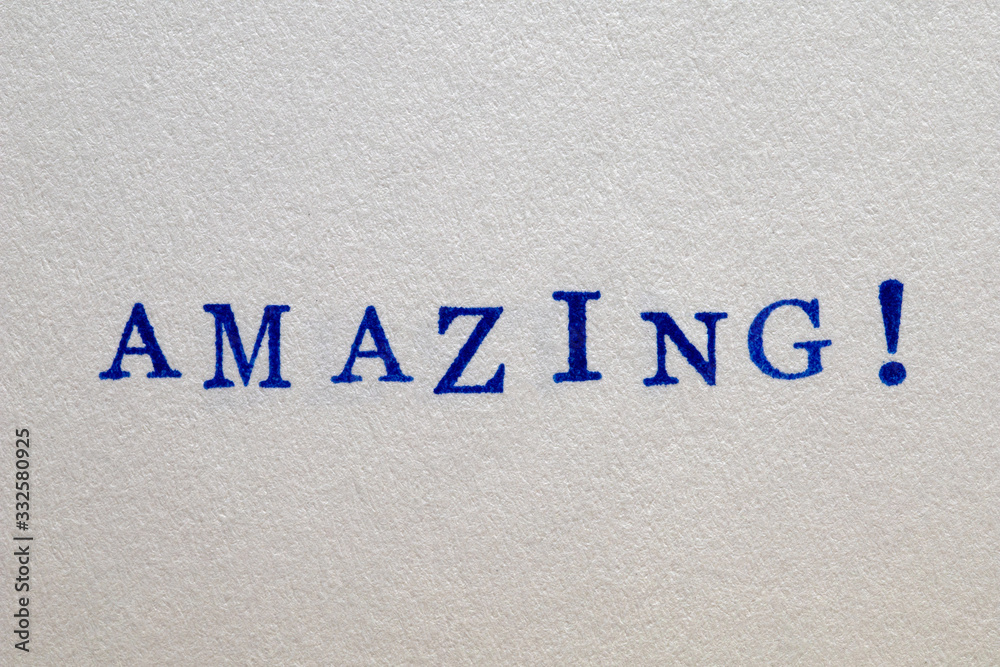 a amazing word stamped on a piece of paper. a amazing word stamped on a piece of paper.