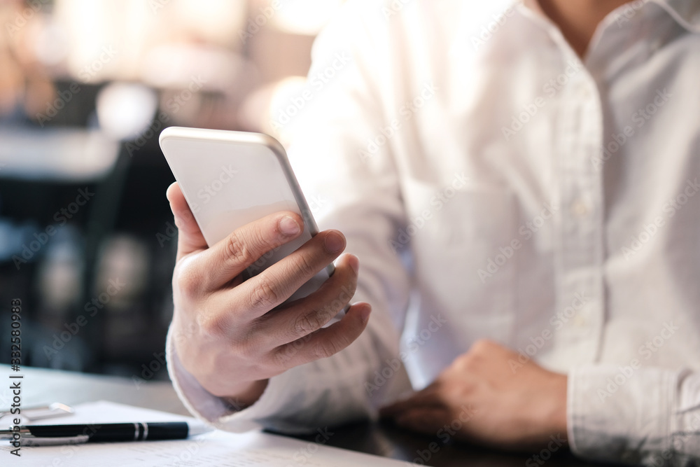 Business man hand hold smart phone. technology concept Business man hand hold smart phone. technology concept
