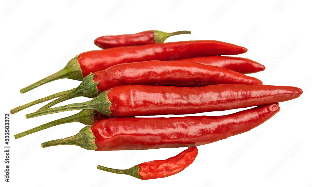 Hot peppers in a glass plate on a wooden background