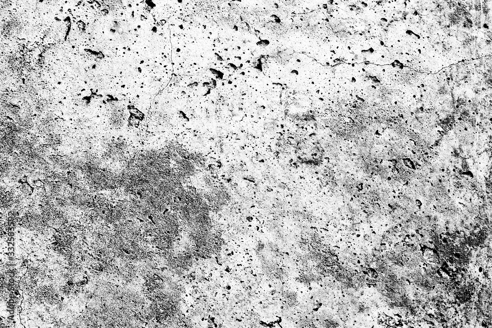 Fototapeta premium Texture of a concrete wall with cracks and scratches which can be used as a background