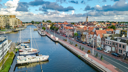 Aerial drone view of Alkmaar town cityscape from above, typical Dutch city skyline with canals and houses, Holland, Netherlands